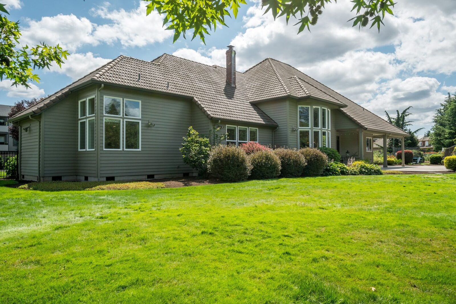 Gray house with professionally painted siding